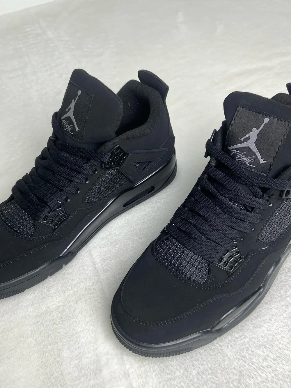 Jordan Men’s Black Retro 4 Sneakers